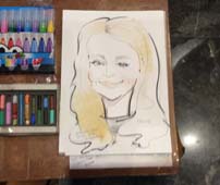 шарж на ватмане молодой женщины в Журавинке крестик черное платье