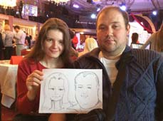 шарж держат на свадебной выставке Ирина и Иван